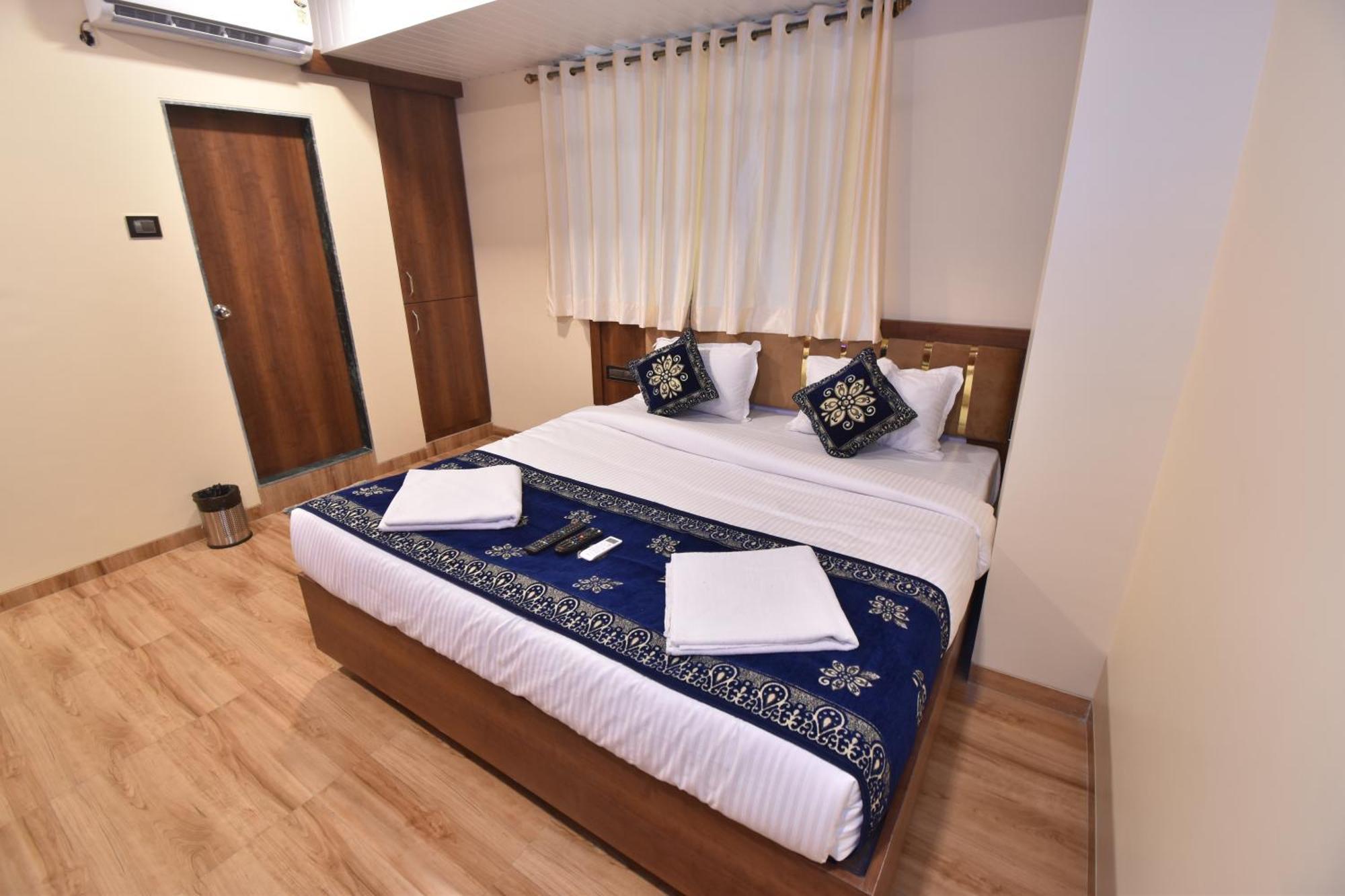 Hotel Starlit Нави Мумбай Стая снимка
